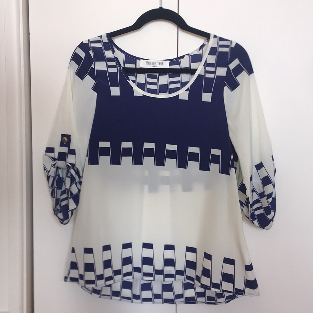 Blue and white geometric pattern blouse